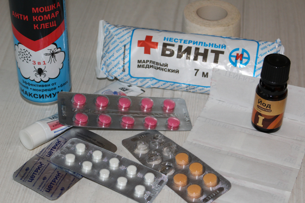 bandage, pills, first aid kit.JPG